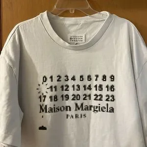 MAISON MARGIELA ‘Maison Margiela Paris’ t-shirt White Maison Margiela Paris' T Shirt In White - 23% Off | Editorialist